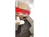 Alex Apartments. White rotunda. 11