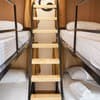 Хостел Mama-hostel. 9-местном номере Кровать в 9-местном общем номере для женщин с балконом  (107436203) 1