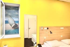 Готель Orange Hotel. Економ двомісний класик без вікна 2