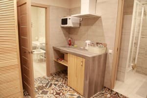 Мини-отель WINE & ROSE BOUTIQUE HOTEL. Люкс 4-местный King Size 11